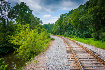 Fototapeta na wymiar Creek and railroad track in rural Carroll County, Maryland.