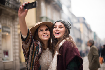 Women taking selfies
