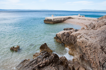 coast of tucepi mare stones and blue sky