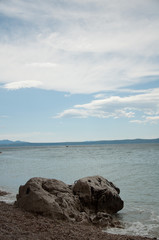 coast of tucepi mare stones and blue sky