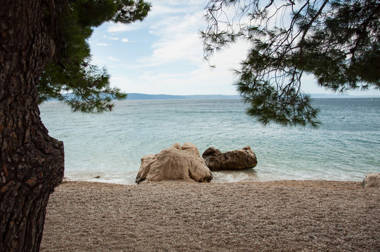 coast of tucepi mare stones and blue sky