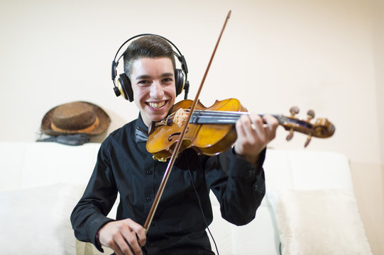 Teen Playing A Violin