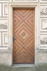 Old wooden door in italian palazzo