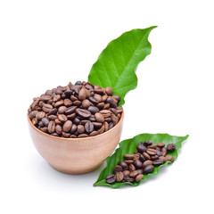 Wooden Bowl with coffee beans and coffee leaf on white backgroun