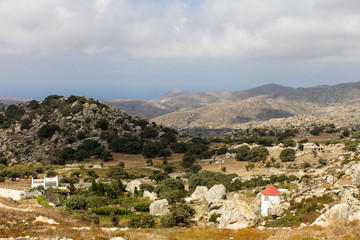 Fototapeta na wymiar Landscape with mill near Koumaros - Tinos - Greek Island - Greece