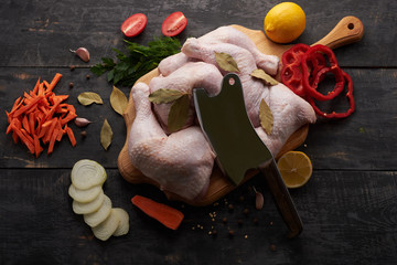 cooking chicken meat, spices and vegetables
