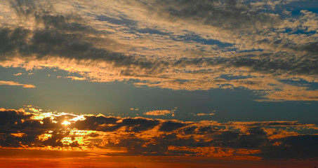 Fiery orange sunset sky background. Beautiful sky in evening time
