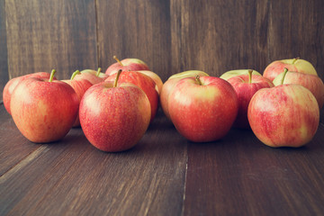 Apples on wooden rustic background