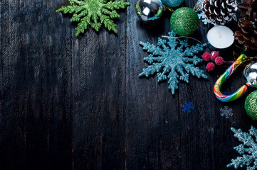 Christmas fir tree with decoration on a wooden board