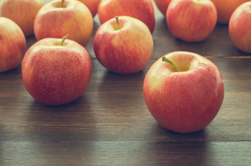 Apples on wooden rustic background