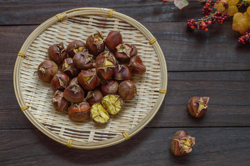 Japanese roasted chestnuts on a bamboo basket