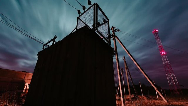 Old electrical transformer station night time lapse video