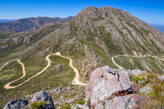 Panorama shot of Swartberg Pass road - Little Karoo area near Oudtshoorn, Western Cape Province, South Africa.Pass is located in the Groot Swartberg Nature Reserve, known for its windy mountain roads.