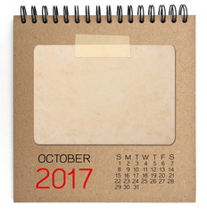 2017 calendar on brown notebook with old blank photo