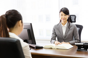 executive asian businesswoman talking in the office