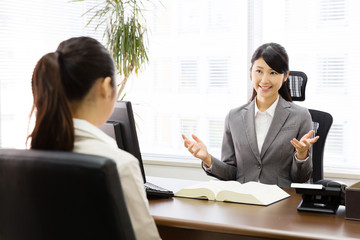 executive asian businesswoman talking in the office