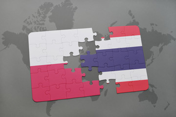 Fototapeta premium puzzle with the national flag of poland and thailand on a world map background. 3D illustration