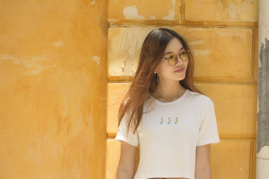 Portrait of thai chinese adult beautiful girl Denim blue travel relax and smile
