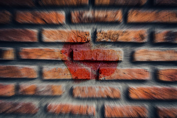 heart on the old broken brick wall