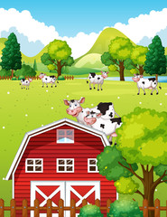 Obraz na płótnie Canvas Farm scene with cows and barn