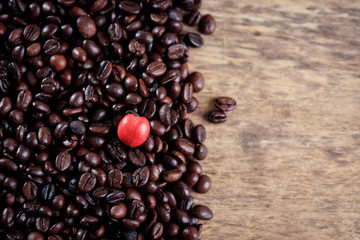 Coffee beans on wooden background