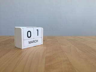 March 1st. March 1 white wooden calendar on vintage wood abstrac