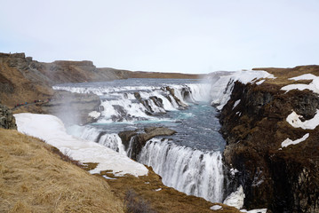 Beautiful GULLFOSS waterfall with meadow