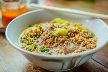 Noodles pork dumplings,spicy soup thai style