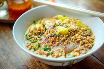 Noodles pork dumplings,spicy soup thai style