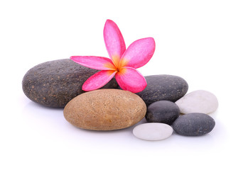Naklejka na ściany i meble stones with frangipani flower isolated on white
