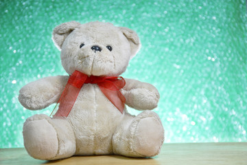 Teddy bear on winter background