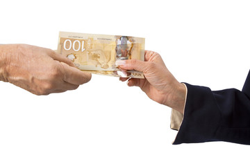 Canadian dollar banknotes in white background.