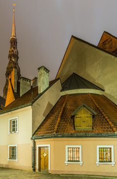 Convent yard in old Riga city by rainy night in autumn
