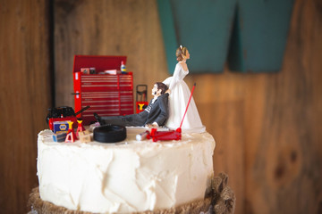 Redneck wedding cake topper with mechanic groom