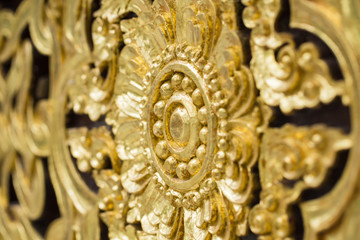 Close up Thai golden flower decoration in temple for background