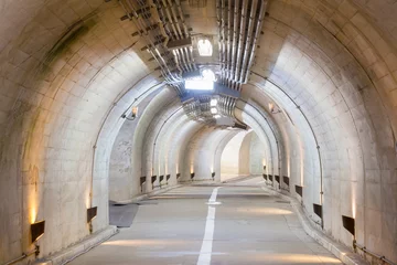 Tableaux ronds sur plexiglas Tunnel Interior of an urban tunnel at mountain without traffic..