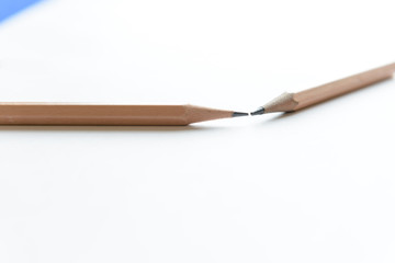 Wooden Pencils on white paper with copy space - Back to school