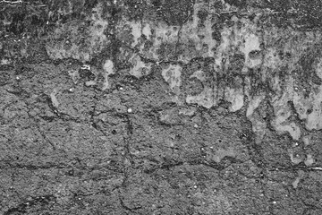 Wall fragment with scratches and cracks
