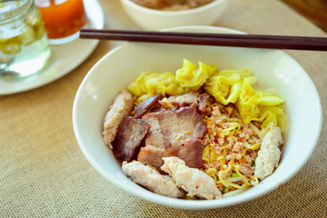 Noodles pork dumplings,spicy soup thai style