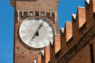 Detail of medieval clock tower of Lamberti (Torre dei Lamberti) in Verona, Veneto, Italy