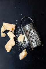 Parmesan cheese with a grater © Maksim Shebeko