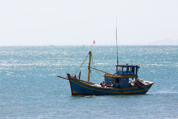 Naklejka na ściany i meble nautical fishing coracles on sea, tribal boats