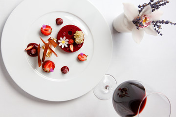 High French cuisine. The dessert of strawberries, chocolate and