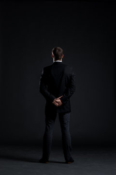 Businessman on a black background