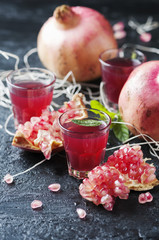 Sweet pomegranate juice on the table