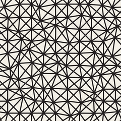 Fototapeta premium Vector Seamless Black and White Irregular Triangles Grid Pattern