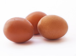 three eggs isolated on white background