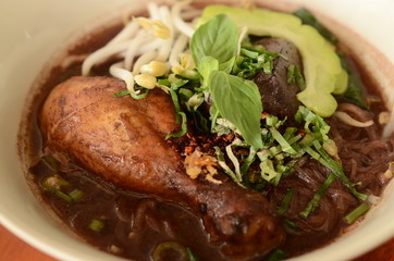 Rice noodle soup with Stewed Chicken Drumstick.thai food.