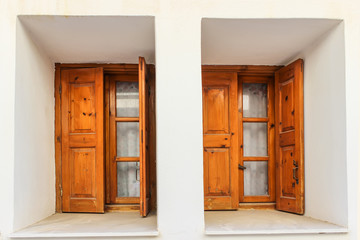 Wooden windows with shutters