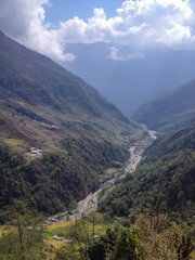 Obraz premium Annapurna base camp route landscape view from Tadapani to Chomrong, mountain, rice field, village, river, Nepal